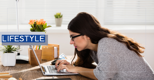 woman slouching at computer